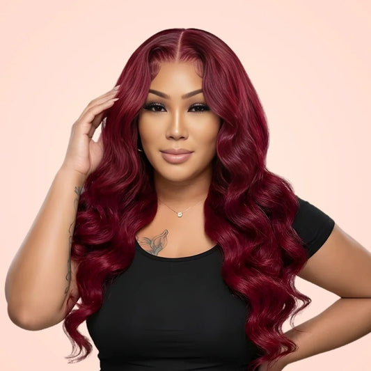 Model wearing a 99J burgundy body wave 13x4 HD lace front wig