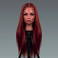 Mannequin head with long red hair on a gray background