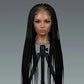 Mannequin head with long braided hair on a gray background