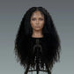 Mannequin head with long, curly black wig on a gray background