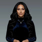 4x6 natural body wave HD lace human hair wig – Woman wearing a dark blue outfit with a fur-lined jacket against a gray background