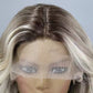 Gold gradient blonde ombre body wave lace wig – Mannequin head with a blonde wig on a gray background
