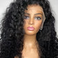Black wig with curly hair on a mannequin head against a neutral background