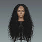 Mannequin head with long black curly wig on a gray background
