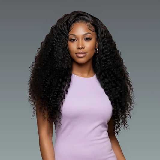 Woman with long, curly black hair wearing a light purple dress against a gray background