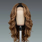 Brown wavy wig on a mannequin head against a gray background
