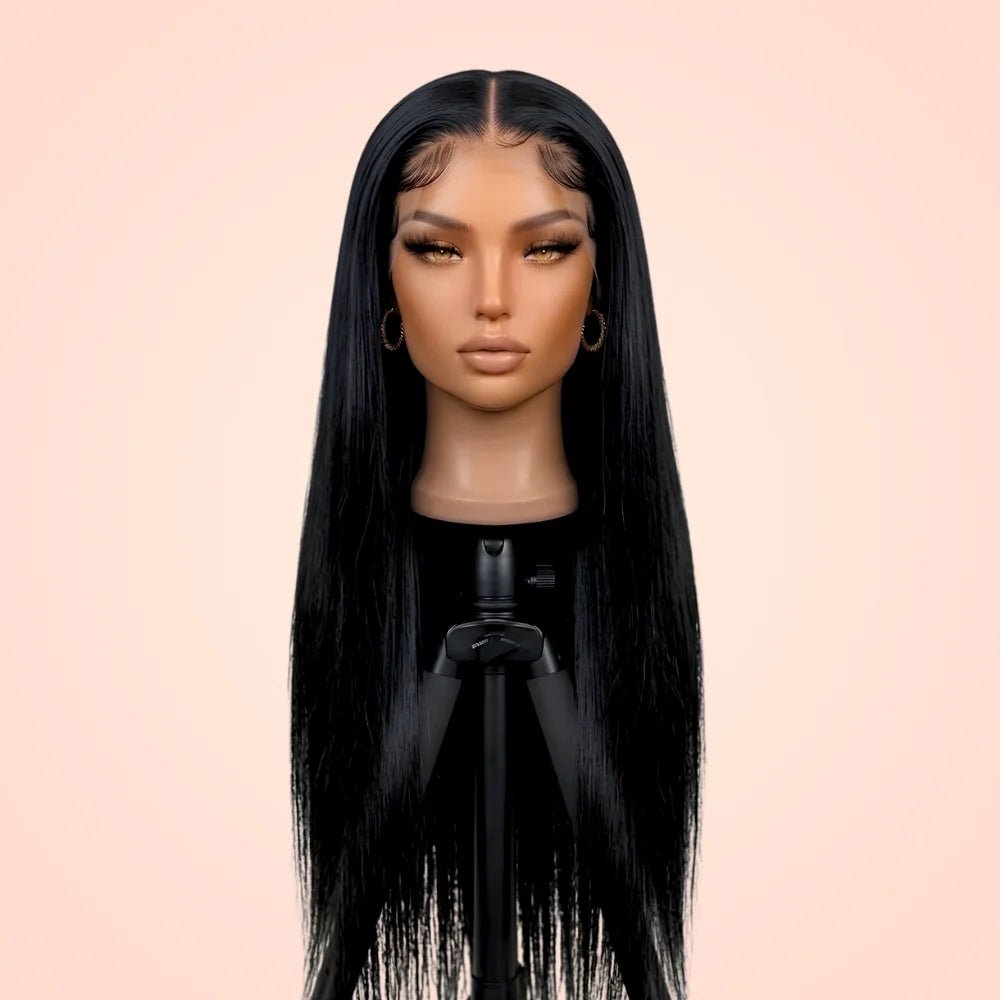 Bone straight 13x4 lace frontal wig with a middle part shown on a mannequin head