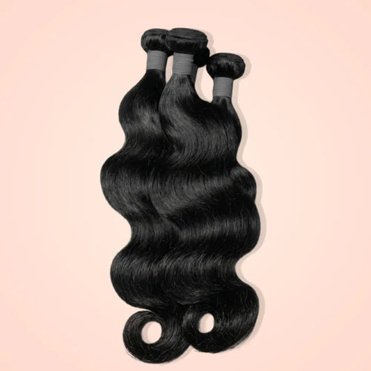 Three bundles of Brazilian body wave human hair in natural black